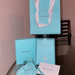 Tiffany & Co. Return to Tiffany Heart Tag Pendant
in Silver, Mini